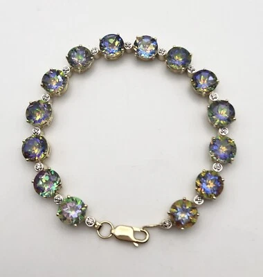 Pulsera de oro amarillo de 14k engastada con topacio místico y 0,04 cts de diamantes 7,25" Foto 1 de 4