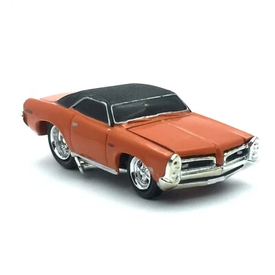The Original Muscle Machines 1966 66 Pontiac GTO Orange Car Die Cast 1/64 Loose - Image 1 of 4
