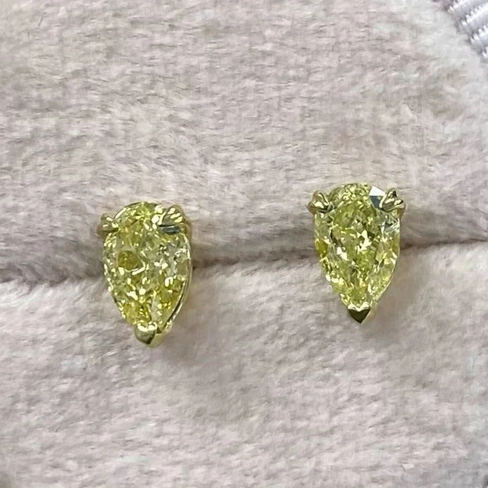 Aretes de diamantes amarillos vivos de lujo cultivados en laboratorio con corte de pera de 2 quilates de oro amarillo de 14 k Foto 1 de 4