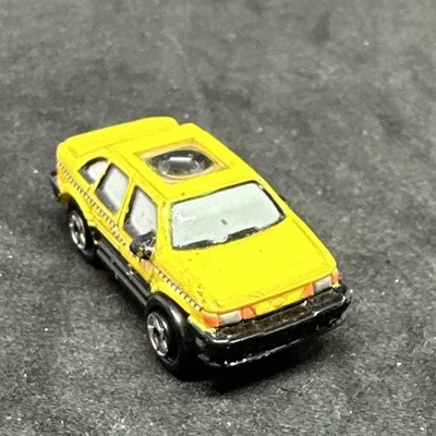 Micro Machines Private Eyes Ford Taurus Yellow Taxi, 1990 Galoob, Vintage - Image 1 of 4