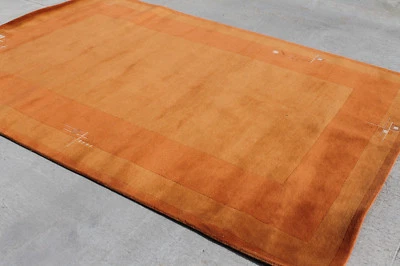 Alfombra contemporánea de lana tibetana RSG713 tamaño 6,7' x 9,8' hecha a mano en Nepal Foto 1 de 4