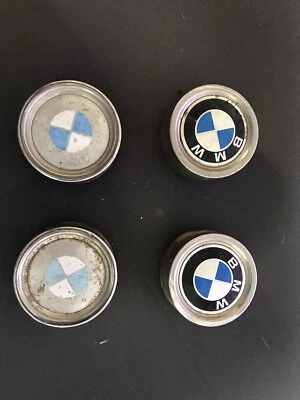 Tapacubos centrales de rueda BMW 318i 320i 323i 325i (4) OEM de fábrica Foto 1 de 4