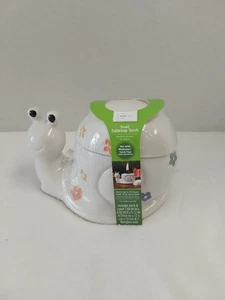 Mainstays Ceramic Snail Tabletop Torch Includes Torch, Cover & 1 Fiberglass Wick - Picture 1 of 4