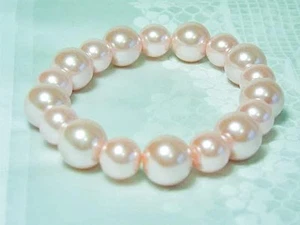 CYNTHIA LYNN "AFTERNOON TEA" GROBES PASTELLROSA GLASPERLEN STRETCH ARMBAND - Bild 1 von 1