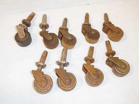Antique Wooden and Stamped Steel Casters  Lot Of 9 Cover