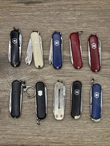 Lot B 10 Victorinox Schweizer Taschenmesser Multitools für Teile Reparatur siehe Bilder - Bild 1 von 2