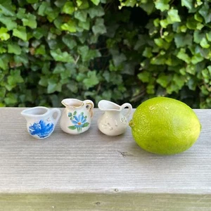 Vintage 3 Miniature 1"White Porcelain Painted Blue Flower w Designs Pitcher Jugs - Picture 1 of 3