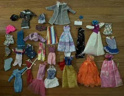 Lot of 31 Vintage & Contemporary Barbie Doll Clothes - Image 1 of 4