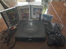 SEGA Saturn + Accessories  + Games Street Fighter Alpha, Daytona USA, NBA JAM