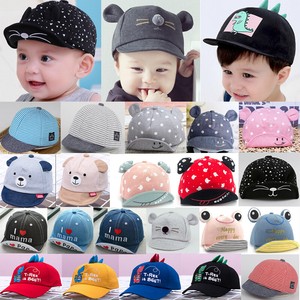 baby with cap