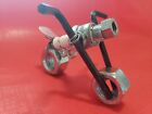 Hanfcrafted Miniature Motorbike Made From Nuts, Washers, and a Used Spark Plug. 