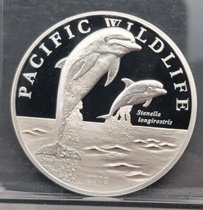 1987 Spinner Dolphins Pacific Wildlife Silver Animal Coin - Picture 1 of 4