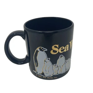 Sea World Coffee Mug Vtg 1985 Black & Gold Penguins & Orca Whale Cup Ceramic - Picture 1 of 23