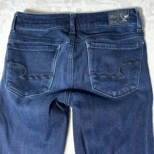 Jeans donna American Eagle taglia 0 skinny elasticizzato jeggings lavaggio scuro AEO denim - Foto 1 di 20