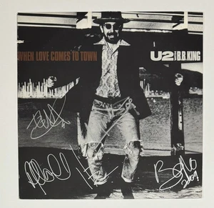 U2 band signed WHEN LOVE COME TO TOWN album Bono Edge Clayton Mullen JSA - Picture 1 of 4