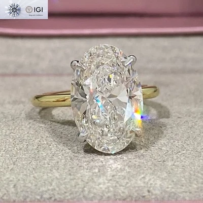 Anillo de compromiso de diamantes cultivados en laboratorio ovalados IGI 4,30 quilates D VS1 oro sólido de dos tonos de 14 quilates Foto 1 de 4
