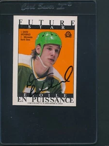 1988/89 O-Pee-Chee Sticker #1 David Archibald North Stars signed Auto *C2411 - Bild 1 von 1