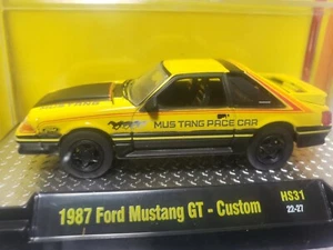 M2 1:64 HOBBY EXCLUSSIVE 1987 FORD MUSTANG GT PACE CAR YELLOW & BLACK SEALED NEW - Picture 1 of 7