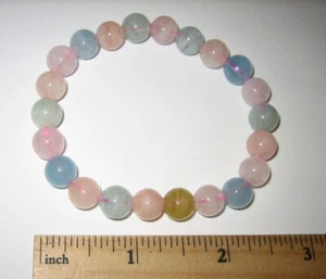 PULSERA ELÁSTICA DE CRISTAL DE MORGANITA/AGUAMARINA REDONDA PULIDA 8,5" 22,2 g *5 - Imagen 1 de 17