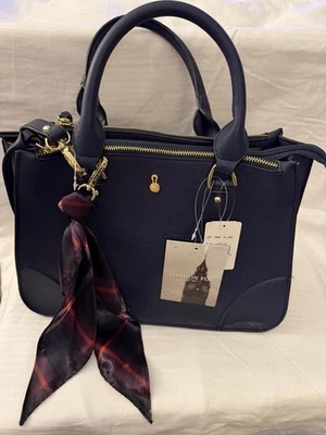 monedero niebla londres Foto 1 de 4