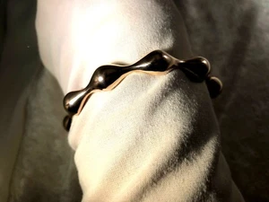 BRONZO ITALIA POLISHED DOMED WAVE ROUND BANGLE ROSE COLOR, 6-3/4"to7" (M1011-18) - Picture 1 of 6
