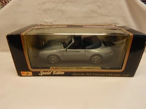 MAISTO SPECIAL EDITION PORSCHE 911 CARRERA CABRIOLET 1994 PALE BLUE BOXED 1:18 - Bild 1 von 10