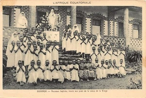 Uganda - The newly baptized, gathered at the feet of the statue of the Virgin - - Picture 1 of 2