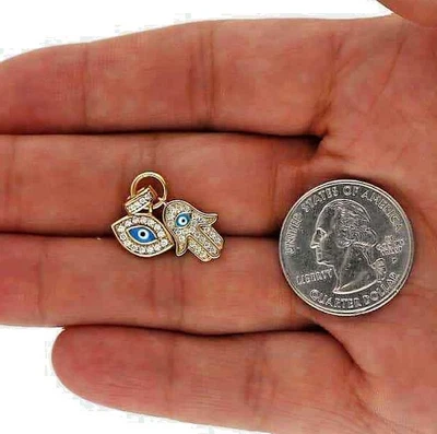Colgante Hamsa Mal de Ojo Oro 14K Sobre Plata con Detalle de Piedra Foto 1 de 4