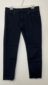 Pantalones de mezclilla Uniqlo para hombre 34 (31x27) negros ajustados cónicos bajos ultra elásticos cortados - Imagen 1 de 16