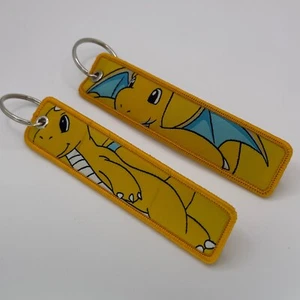 Pokémon Dragonite Jet Tag doppelseitig bestickter Schlüsselanhänger ~ KOSTENLOSER US-VERSAND - Bild 1 von 3