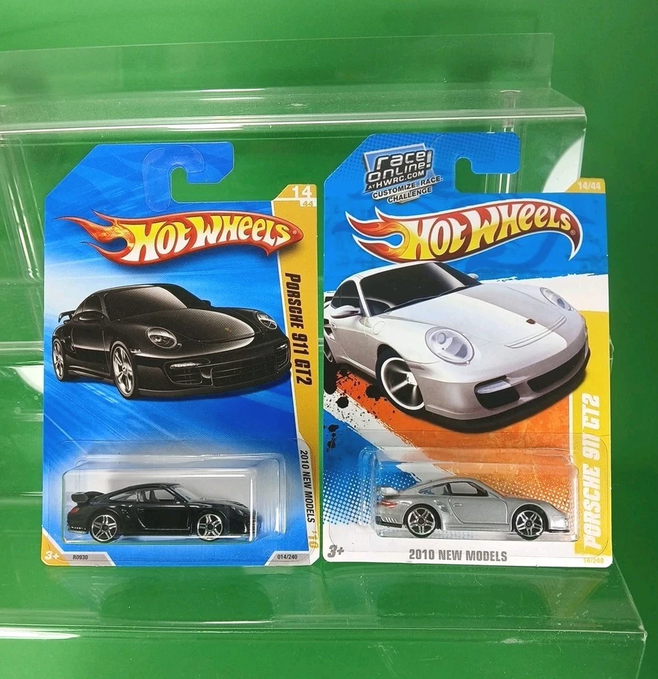 Hot Wheels 2010 Nuevos Modelos Porsche 911 GT2 Lote de 2 Variaciones Plateadas y Negras  Foto 1 de 4