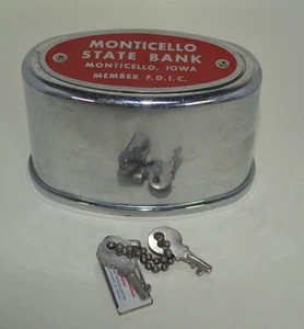 Banco de monedas de metal con bloqueo de banco estatal Monticello de colección con llave - Imagen 1 de 3
