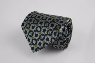 Corbata de seda platino XMI. Verde azulado con formas geométricas negras y marrones. Foto 1 de 3