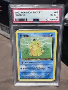 2000 Pokémon Rocket 🚀 Psyduck #65 NM-MT PSA 8 - Picture 1 of 2