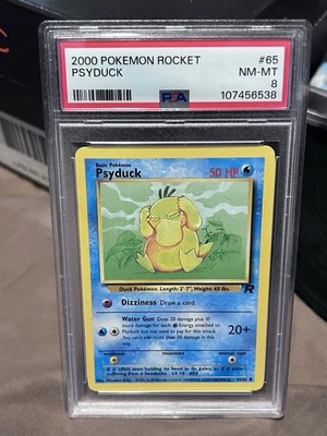 2000 Pokémon Rocket 🚀 Psyduck #65 NM-MT PSA 8 - Image 1 of 2