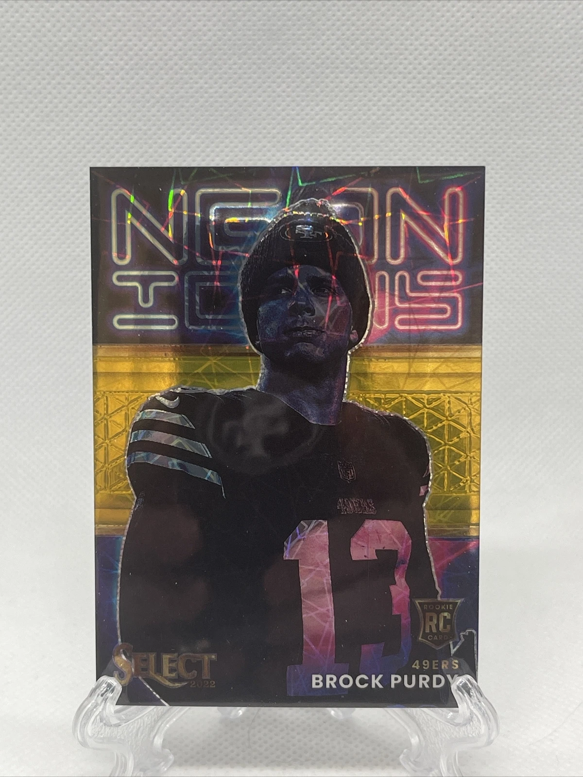 2022 Panini Select Brock Purdy Neon Icons Gold Prizm /10 RC