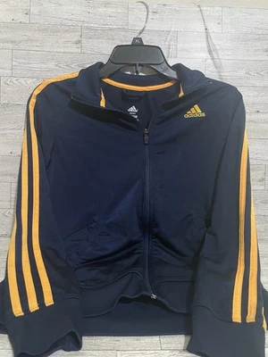 Chaqueta deportiva Adidas azul marino y dorada para niños talla mediana 10-12 Foto 1 de 4