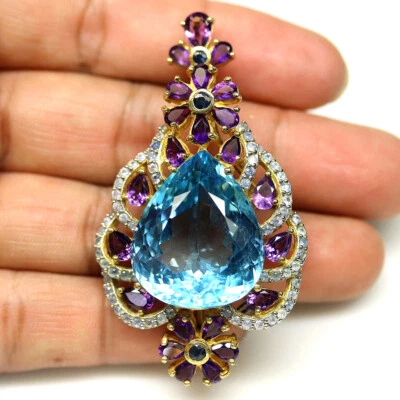 Plata 925 22 x 26 mm. Broche/colgante suizo de topacio azul, amatista y zafiro  Foto 1 de 4