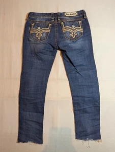 Pantalones de mezclilla para mujer Rock Revival 32 Kila ajustados tiro medio imitación solapa flor dobladillo crudo azul - Imagen 1 de 12