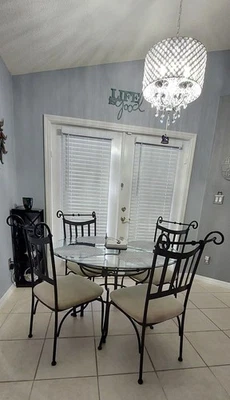 Nice 45 Inch Round Black Metal & Glass Table Set W/4 Cream Cushioned Chairs Used - Image 1 of 4