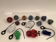 LARGE BEYBLADE BURST LOT OF 9 WITH 5 LAUNCHERS