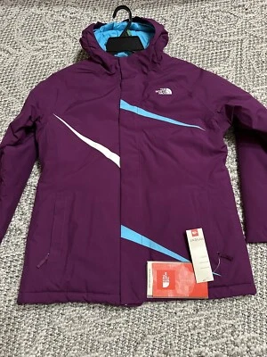 CHAQUETA MORADA IMPERMEABLE CON CAPUCHA THE NORTH FACE PARA NIÑAS NUEVA CON ETIQUETAS. TALLA XL-18 PRECIO DE VENTA SUGERIDO POR EL FABRICANTE $130 Foto 1 de 4