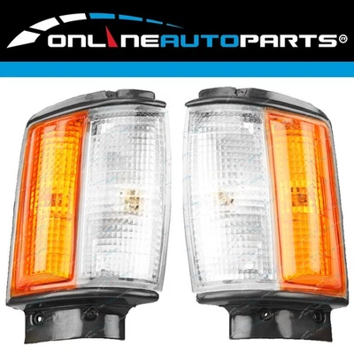 LH+RH Corner Indicator Park Lights Pair w/Black Trim for Toyota Hilux 2WD 83-88 - Image 1 of 4