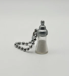 Bratz Babyz Puppe Milch Babyflasche Zubehör Mini Getränk kurze Kette - Bild 1 von 4