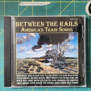 Used Music Audio CD Between The Rails America's Train Songs Album GNPD 2349 - Picture 1 of 4