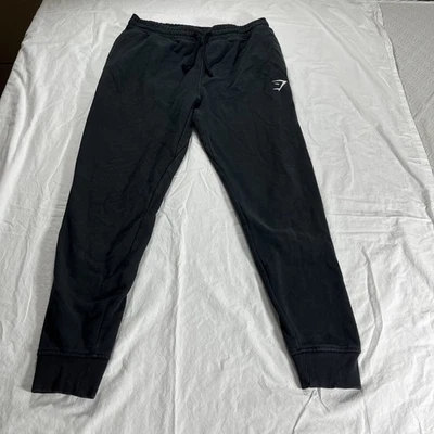 Calça de moletom Gymshark masculina média preta logotipo atlético bolso A2A4H - Imagem 1 de 4