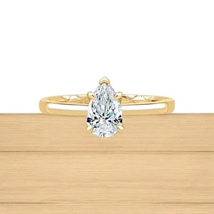 Anillo de boda de diamantes de 1,10 quilates certificado IGI en laboratorio talla pera de oro amarillo de 18 k - Imagen 1 de 11