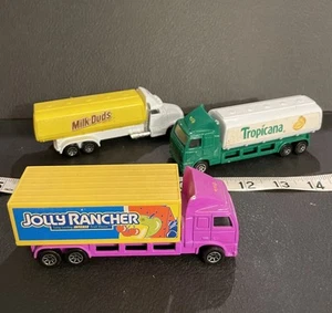 1996 Hot Wheels Haulers Trucks (Milk Duds/ Tropicana / Jolly Rancher) lot of 3 - Picture 1 of 9