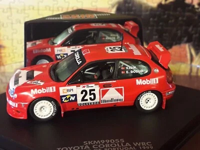 skid skm99055 toyota corolla wrc rally portogallo 1999 V.ISIK 1:43 - Immagine 1 di 4