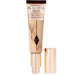 Base líquida Charlotte Tilbury Beautiful Skin cobertura media #4 cálida NUEVA - Imagen 1 de 8
